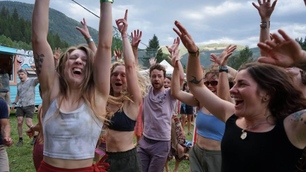 People dancing and enjoying a festival